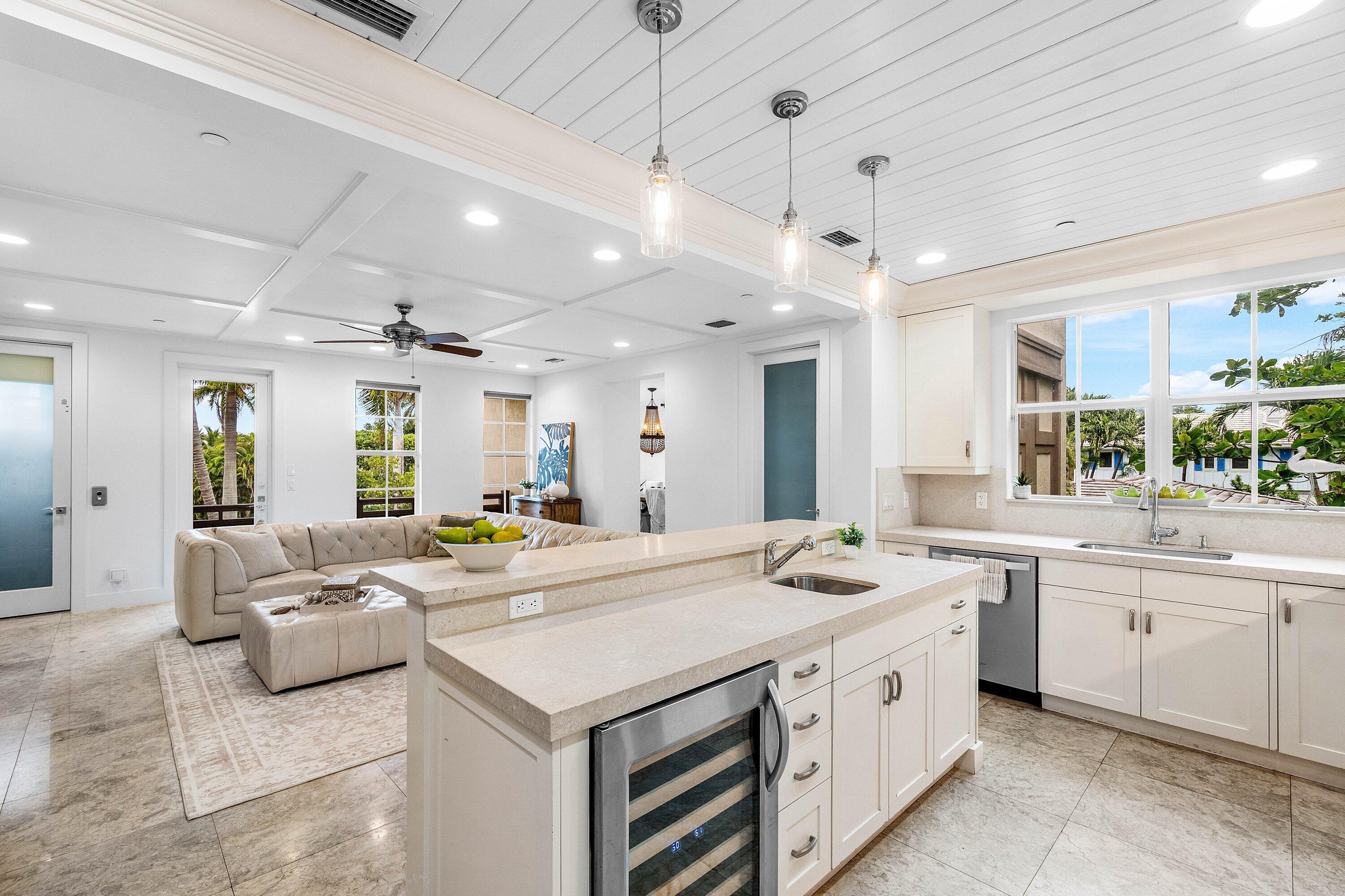 Image 4: Open floorplan kitchen and living spaces.