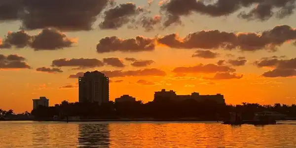 Image 4: VIEW OF REAR OF BUILDING AT SUNRISE