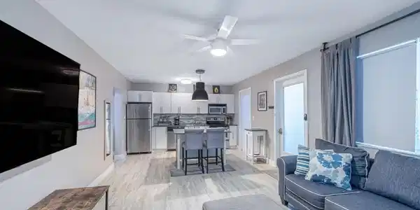Image 4: Right door is entry into open kitchen and living a
