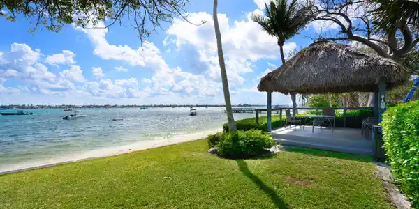 Image 2: Private beach with Tiki hut