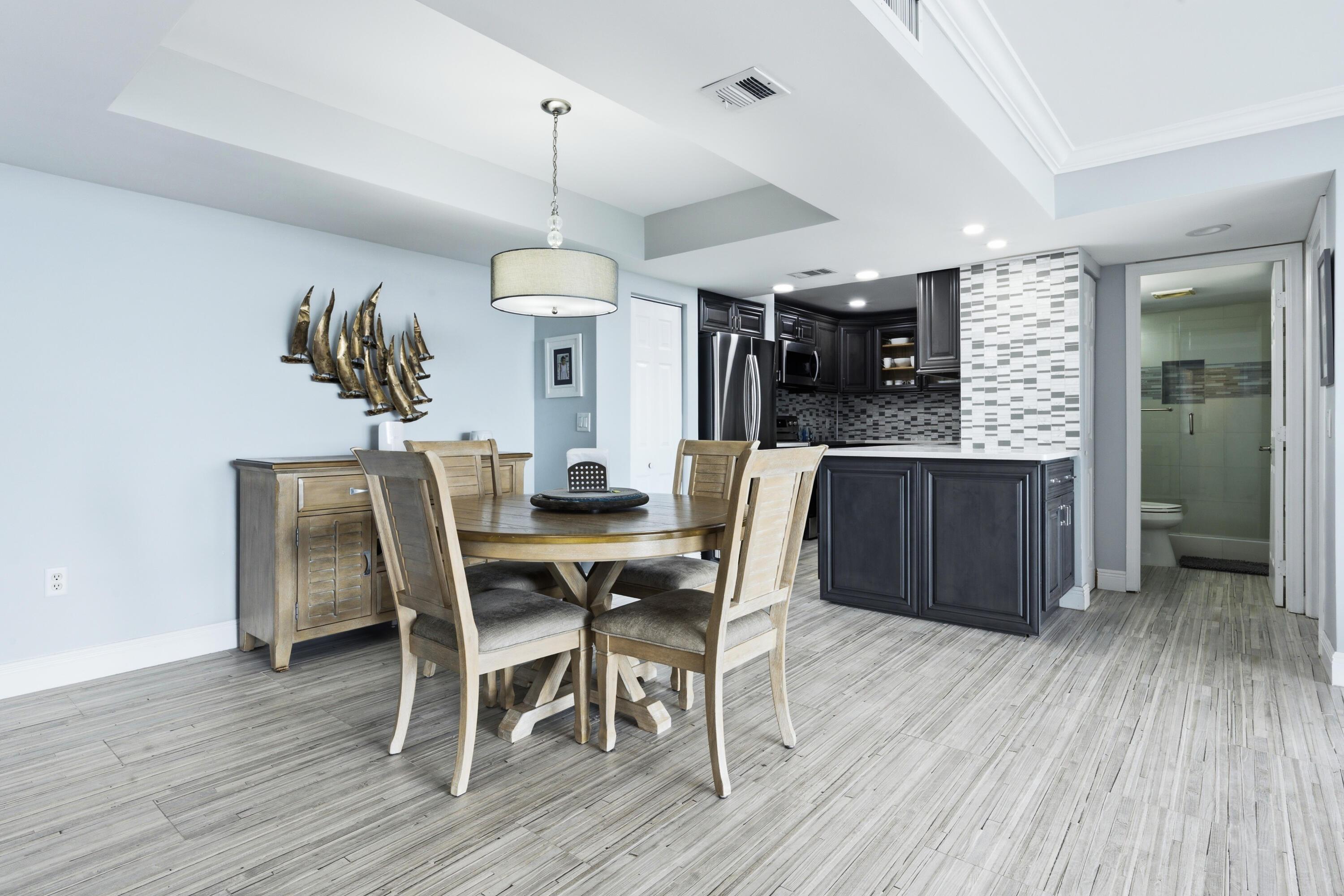 Image 4: Dining area with tray ceiling