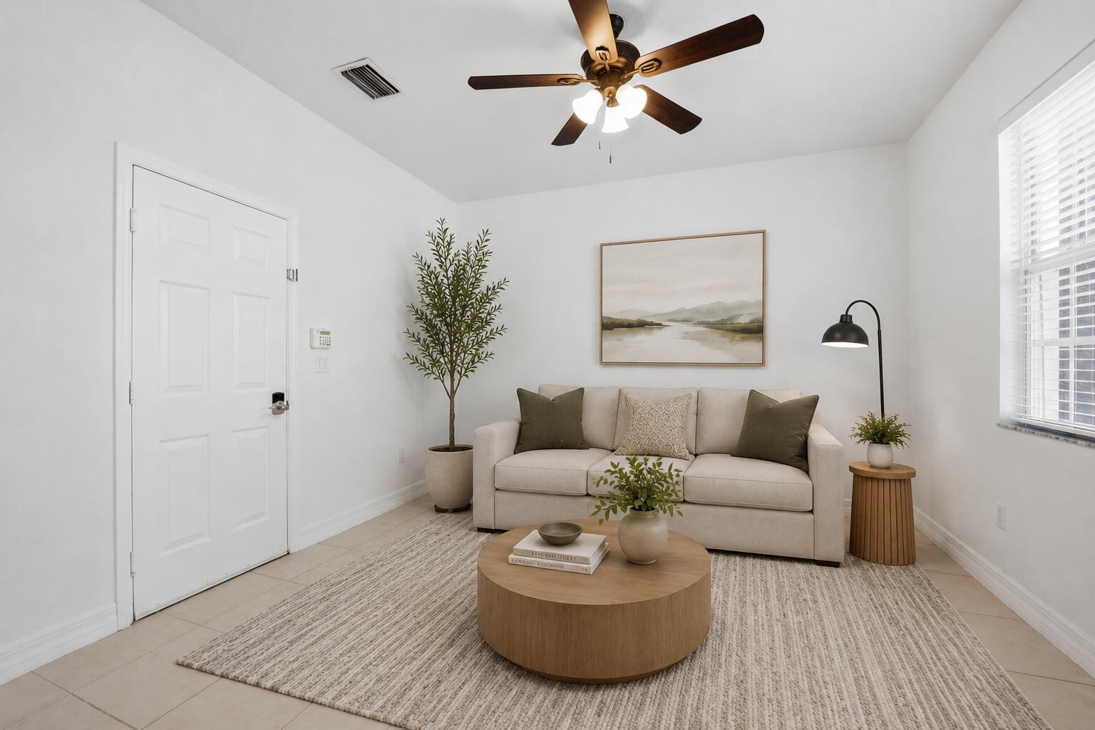 Image 4: staged den.bedroom
