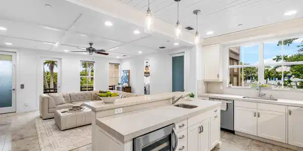 Image 4: Open floorplan kitchen and living spaces.