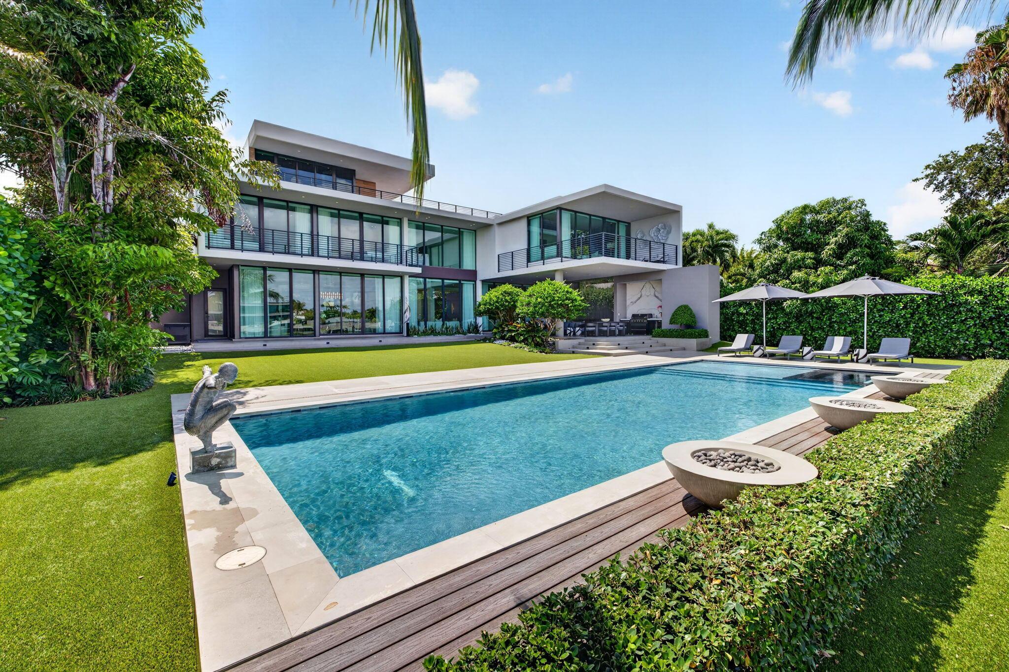 Image 2: A resort-inspired waterfront property showcasing t
