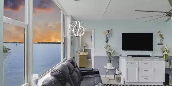 Image 3: living room/water view