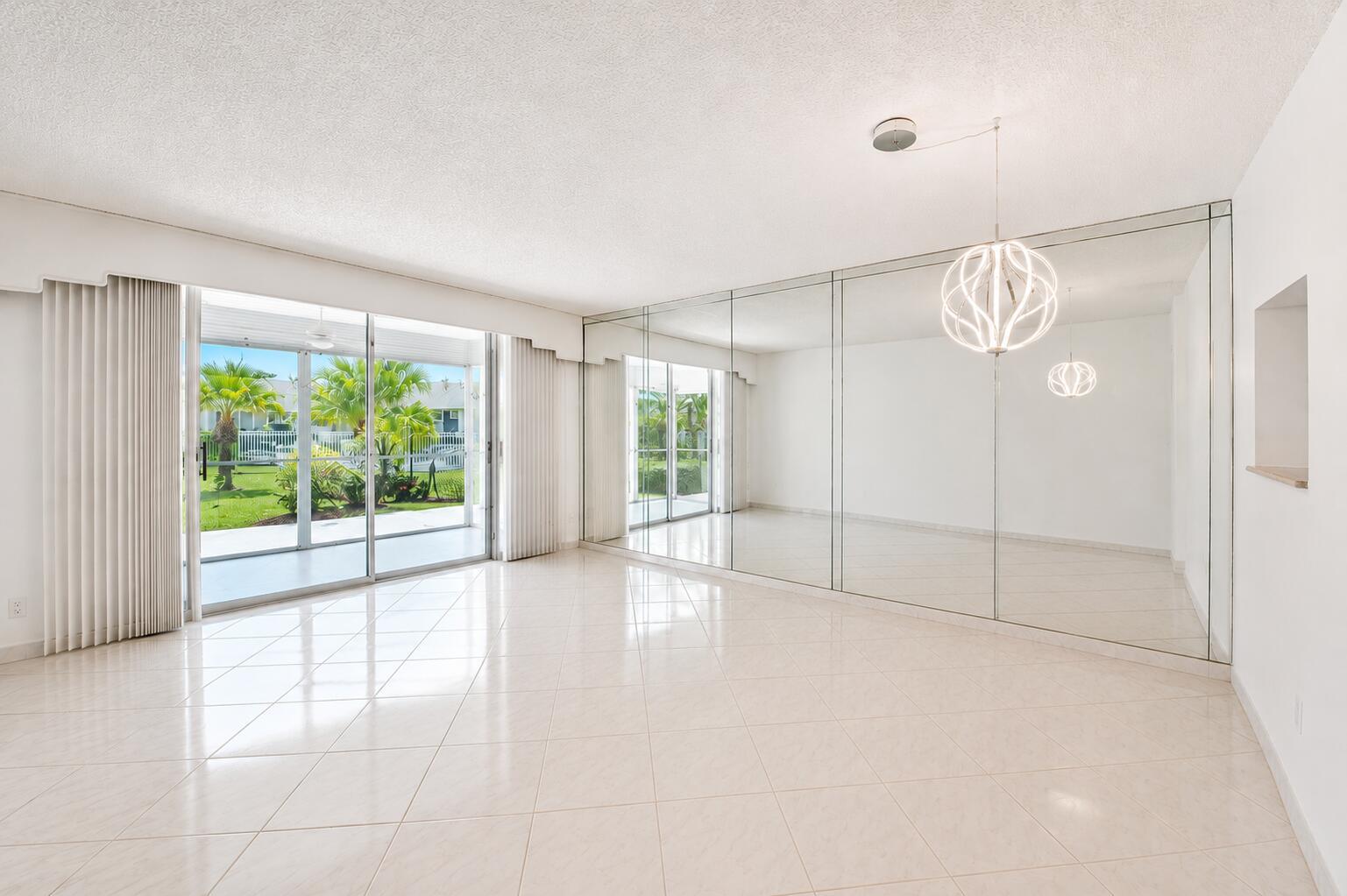 Image 4: Spacious interior featuring large format tile floo