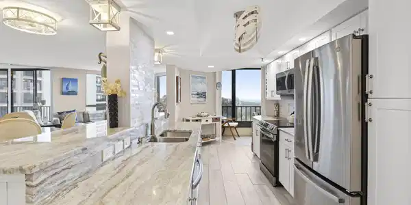 Image 4: Completely renovated kitchen featuring high-end gr