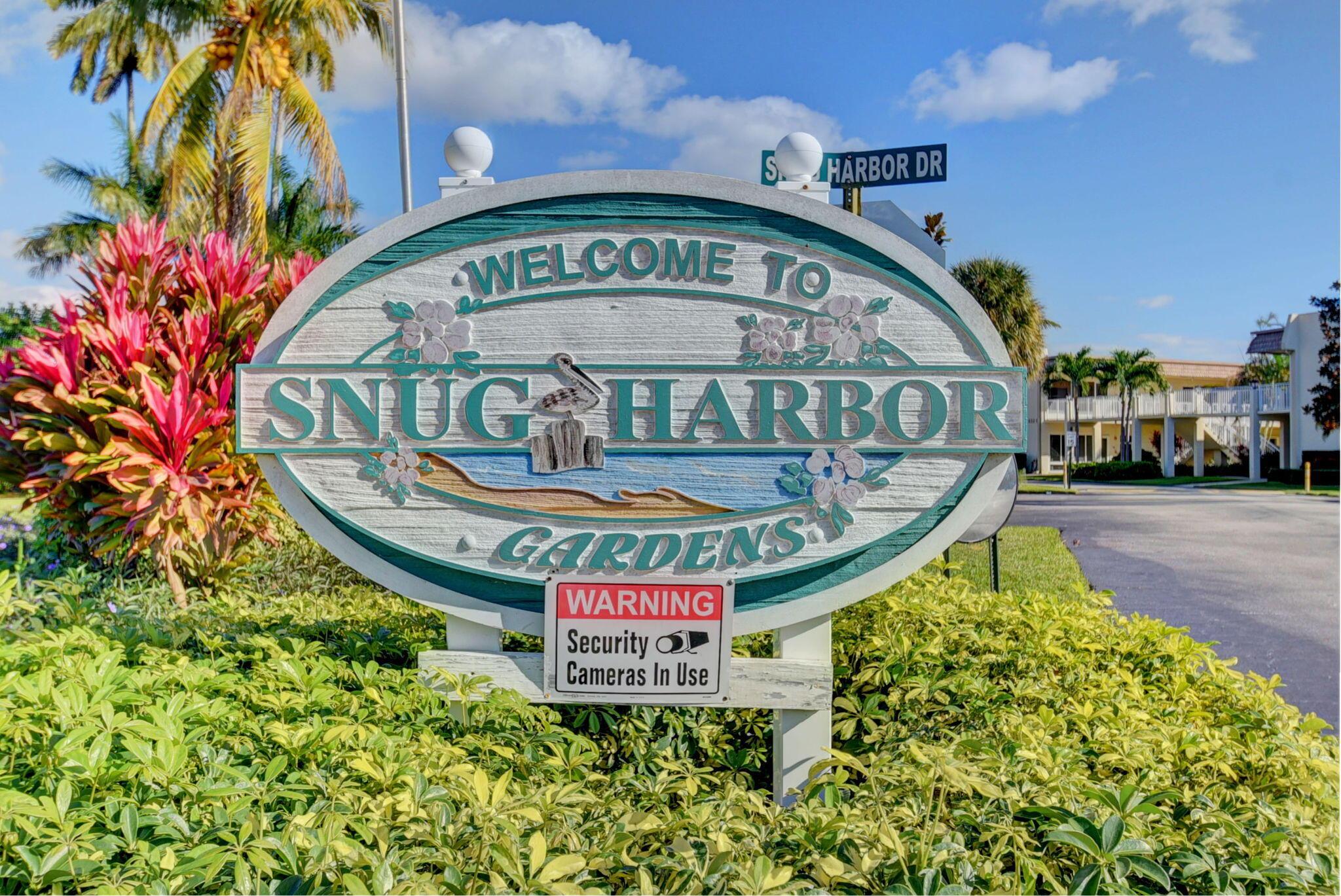 Image 2: Snug Harbor Sign