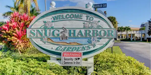 Image 2: Snug Harbor Sign