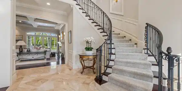 Image 4: Foyer With Winding Staircaase