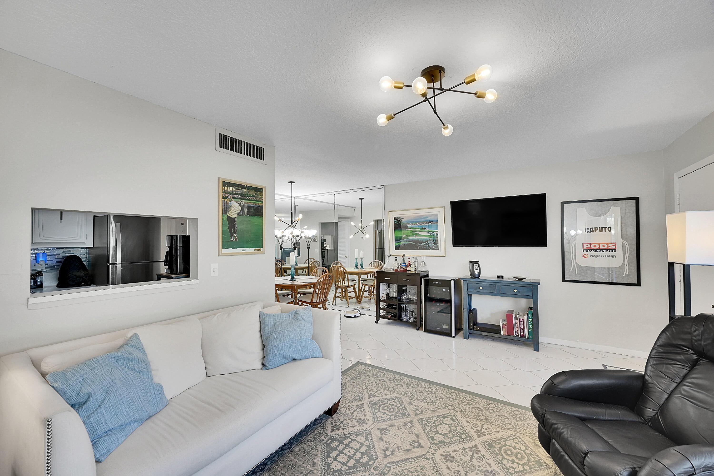 Image 3: Living room looking at Dining