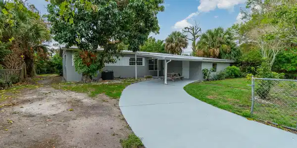 Image 3: Exterior Front with existing driveway