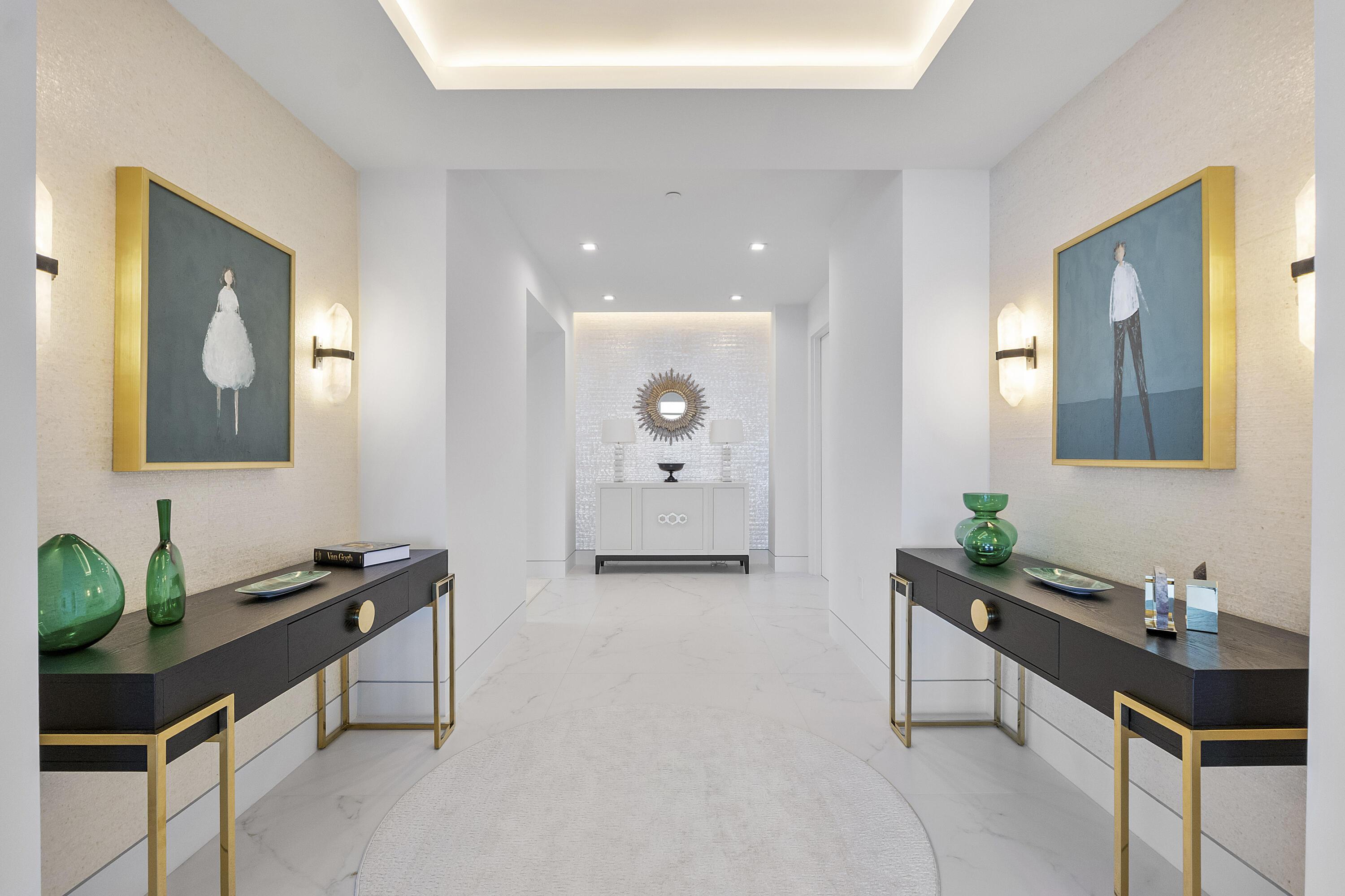Image 1: This is the stunning foyer as you walk into the Pe