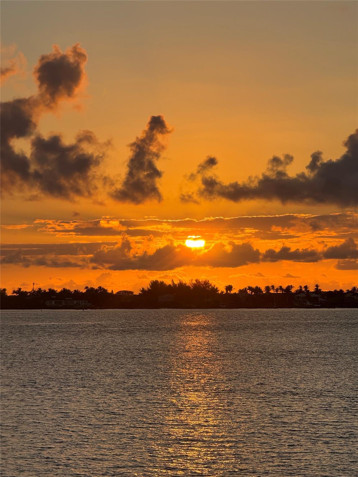 Image 3: View of morning sunrise from sunroom