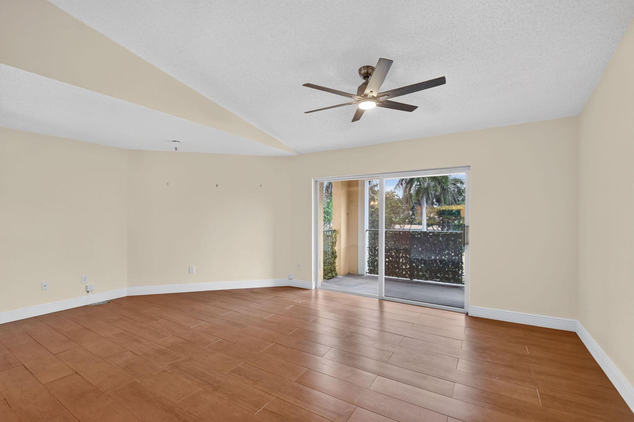 Image 3: Bright Living Room with Patio Access