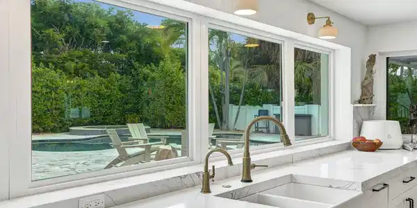Image 3: KITCHEN WINDOW VIEW POOL