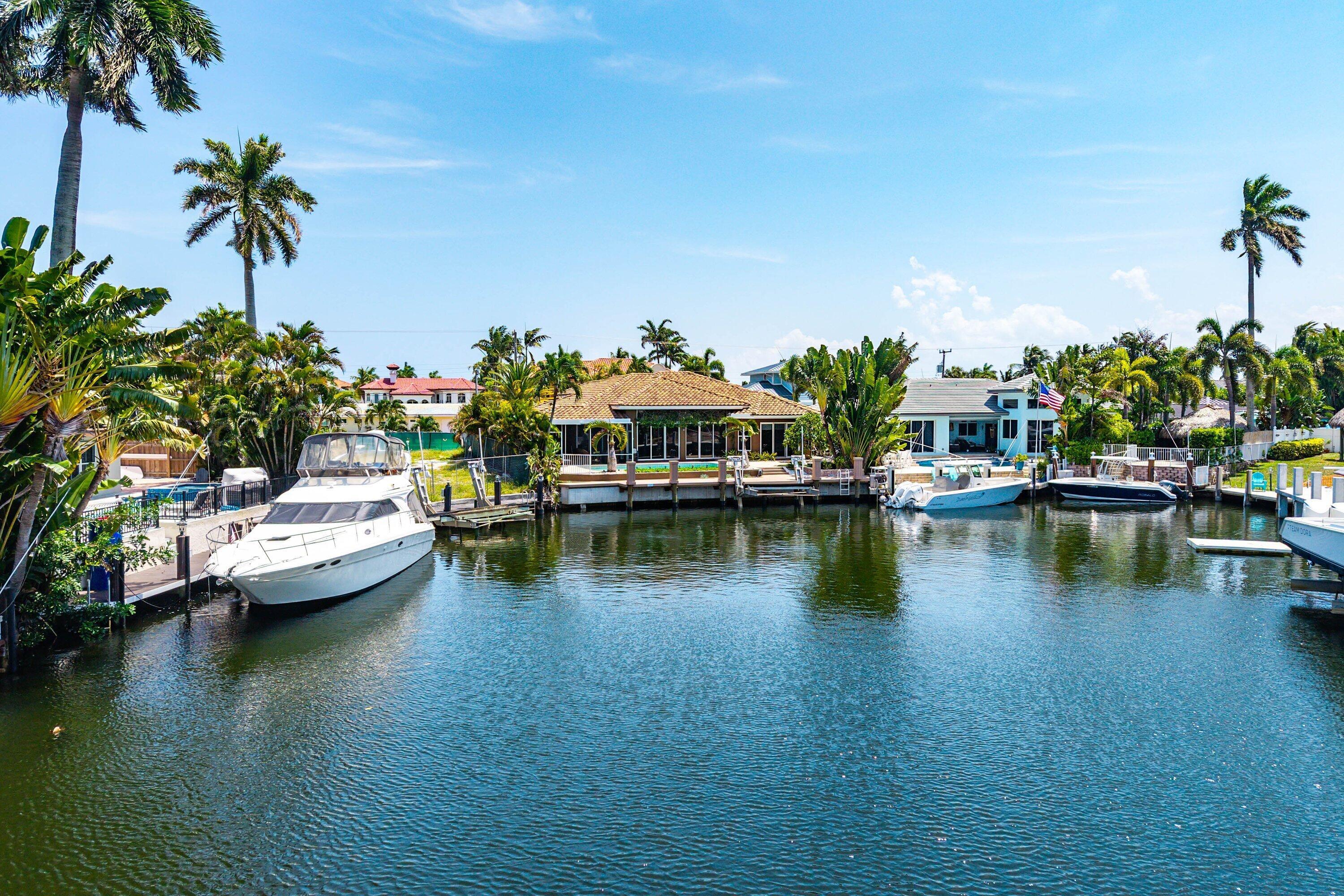 Image 2: Waterfront property featuring a private boat dock,