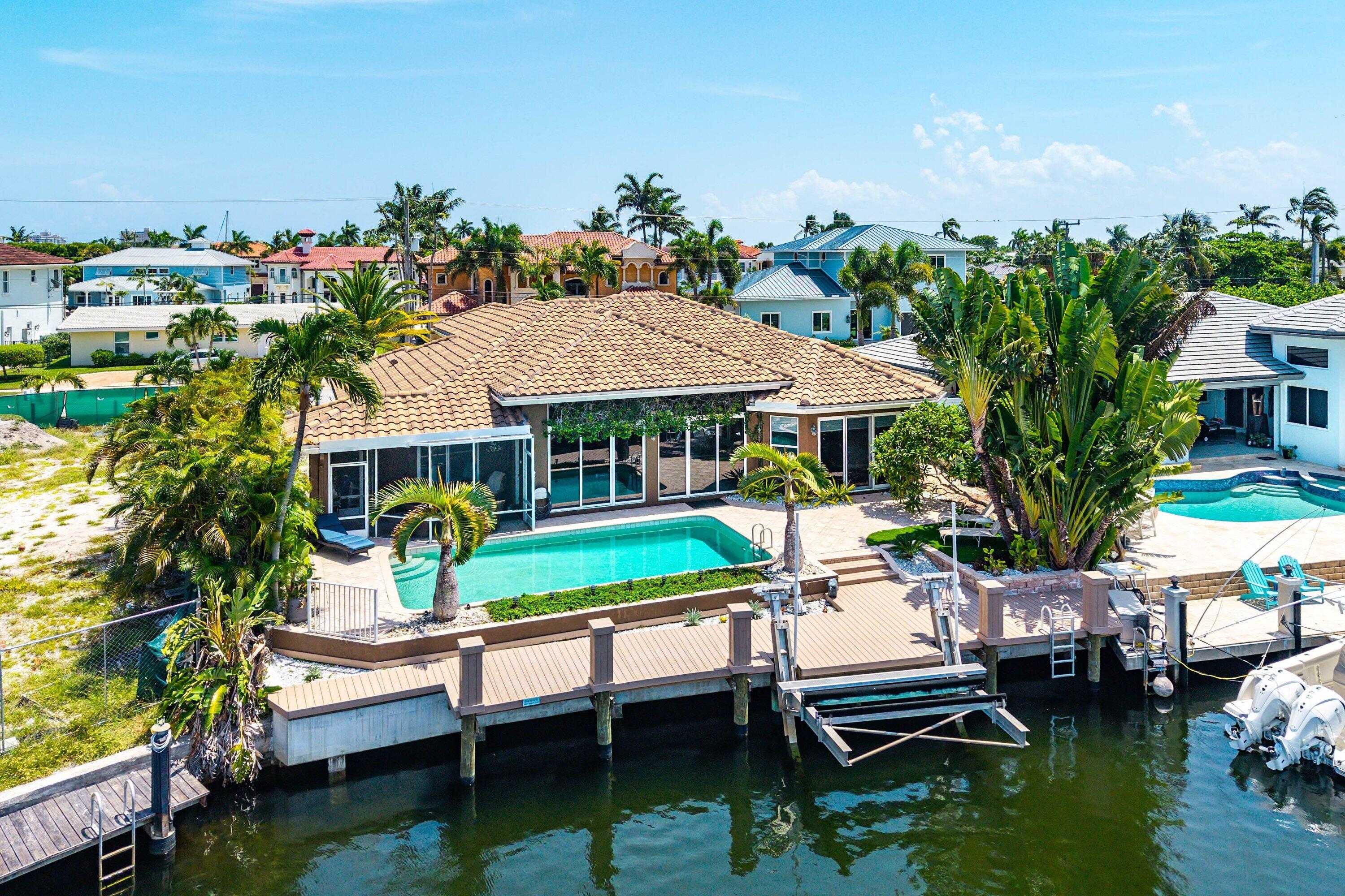 Image 3: Waterfront property featuring a private pool, new