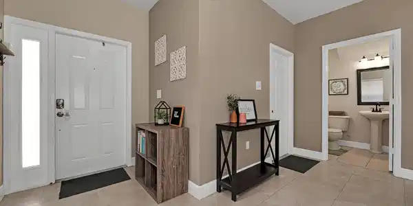 Image 4: Entryway + 1/2 Bathroom