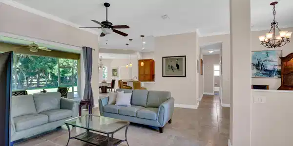 Image 3: Living room with sliders that pocket all the way b
