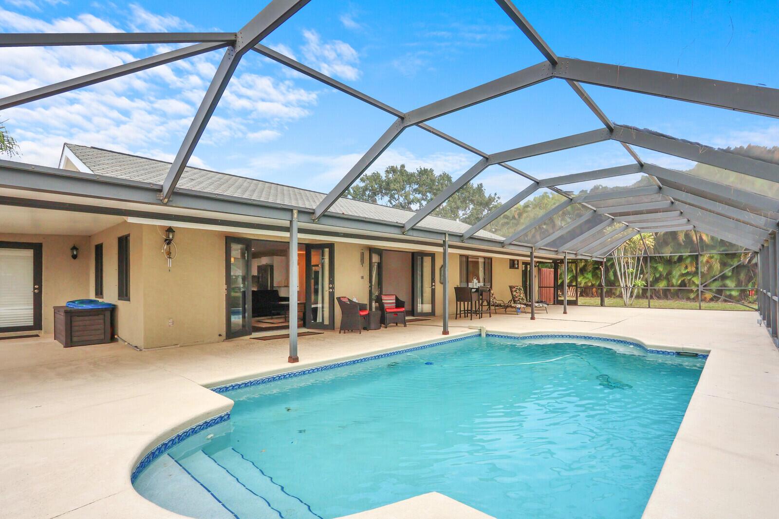 Image 2: Newly rescreened pool enclosure
