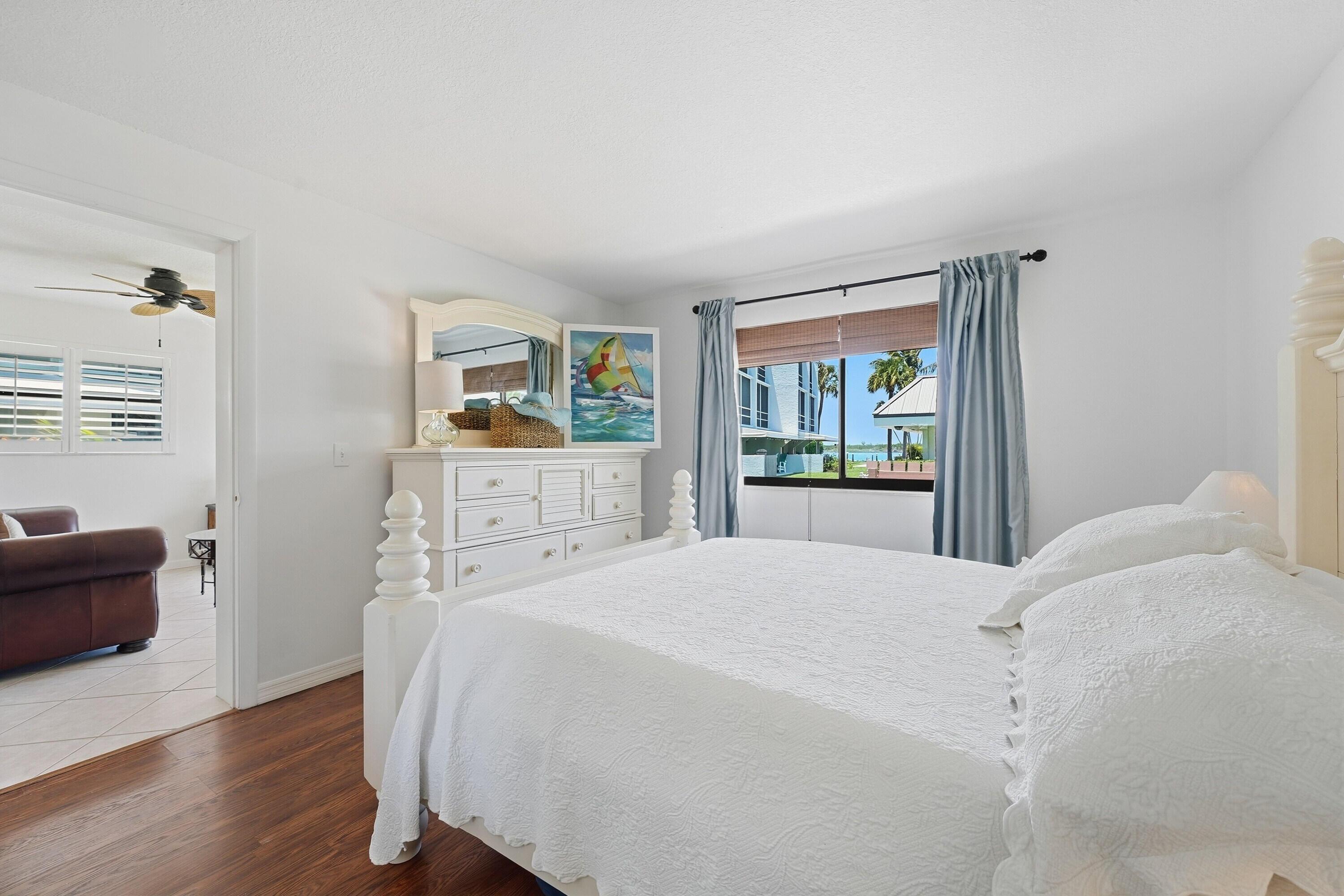 Image 4: Premier bedroom with gorgeous inlet views.