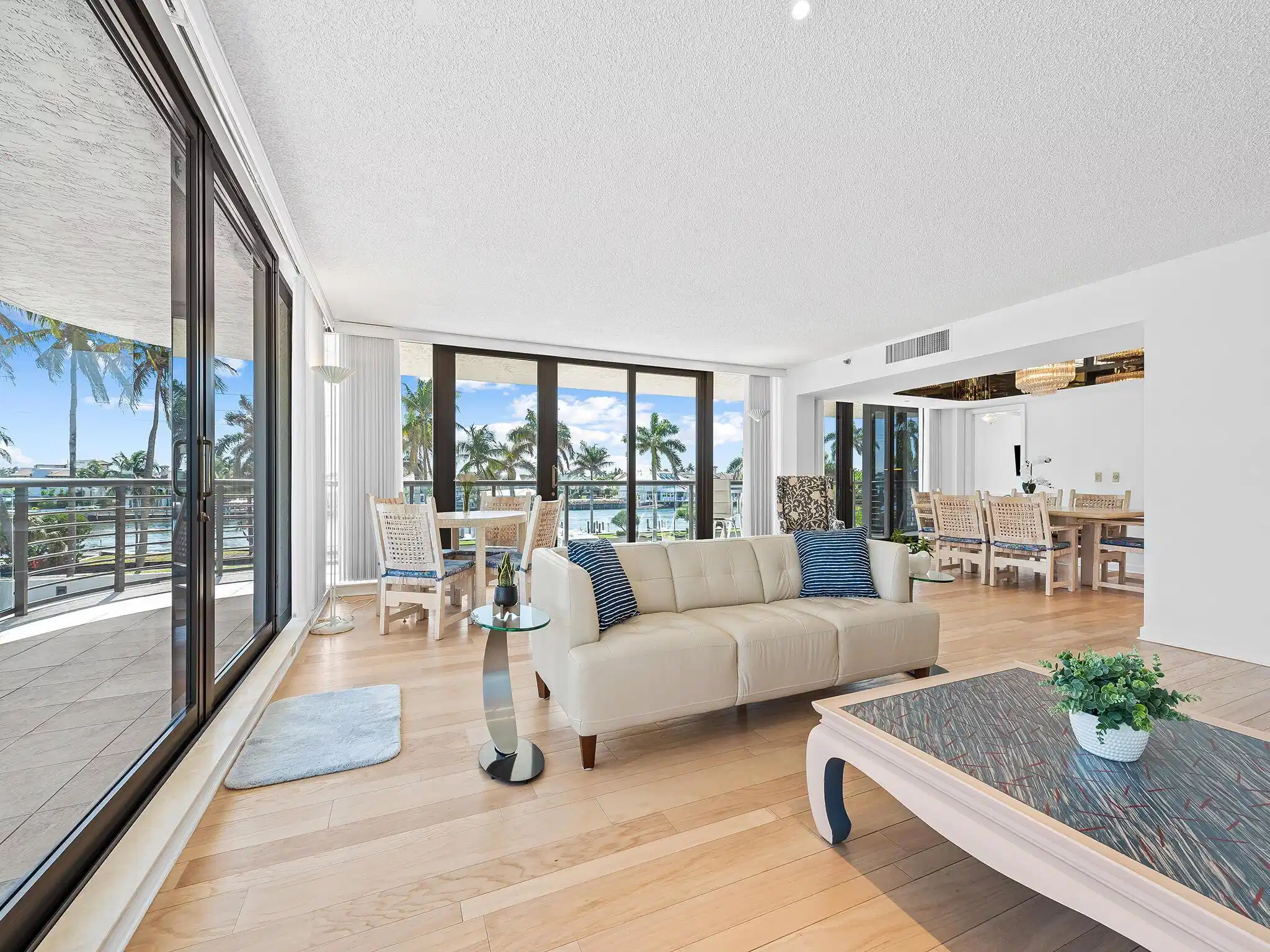 Image 1: Large open living room surrounded by deep balcony