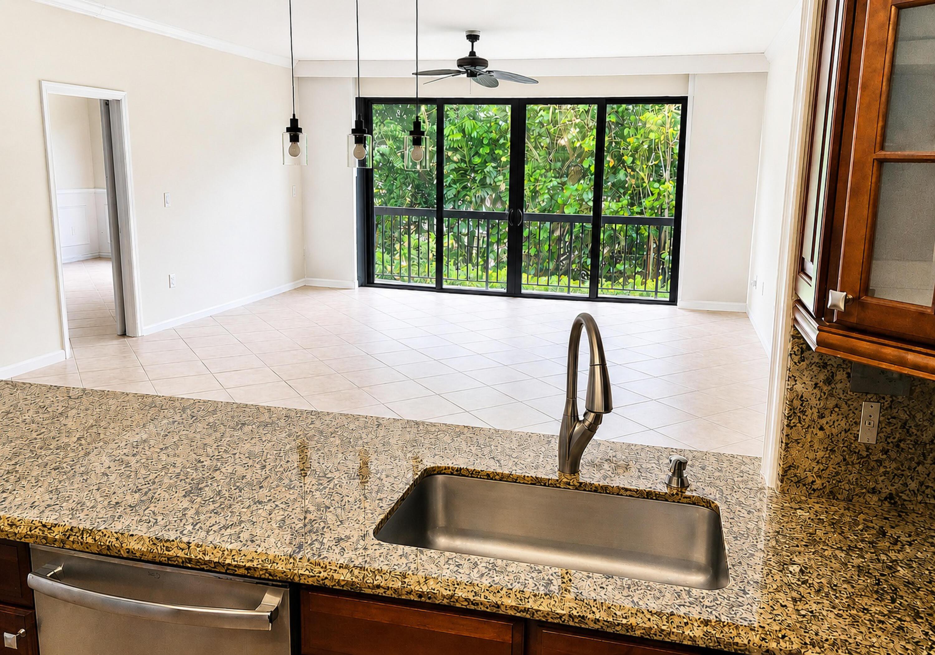 Image 3: kitchen looking into living area