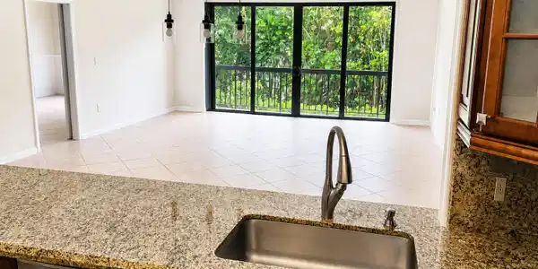 Image 3: kitchen looking into living area