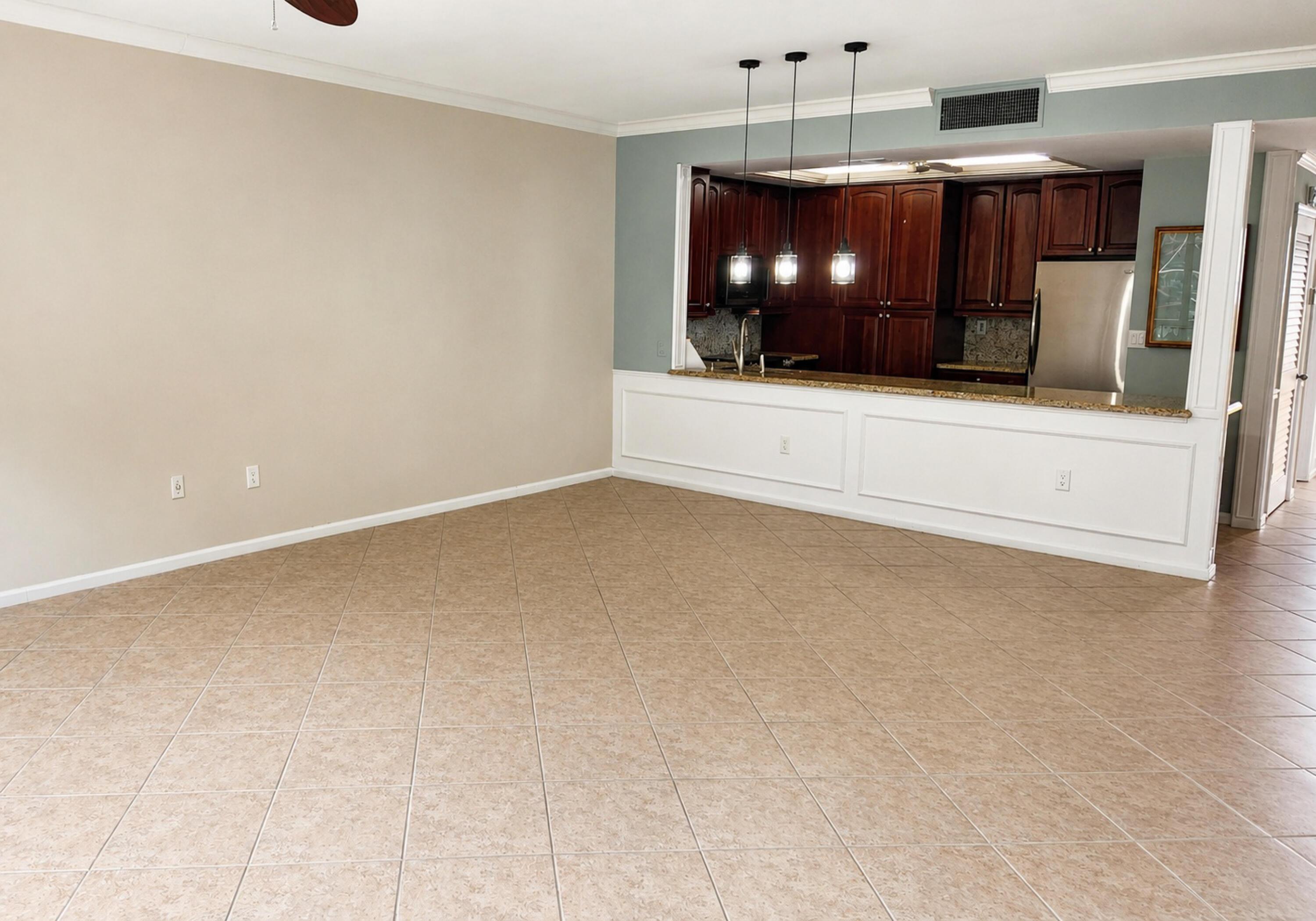 Image 4: living area looking back at kitchen