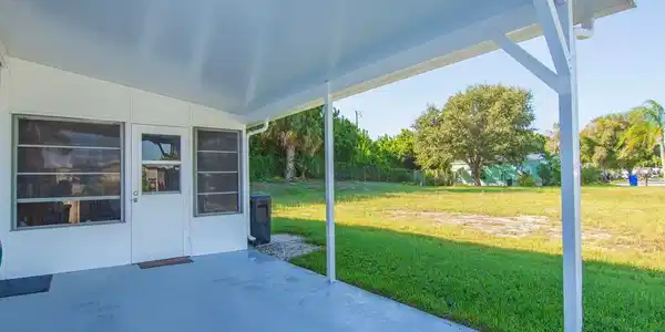 Image 4: Covered patio with a concrete surface and direct o