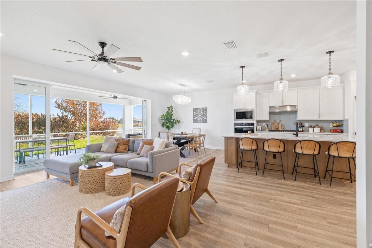 Image 3: First Floor w/ Open Sliders View, Open Concept LR,