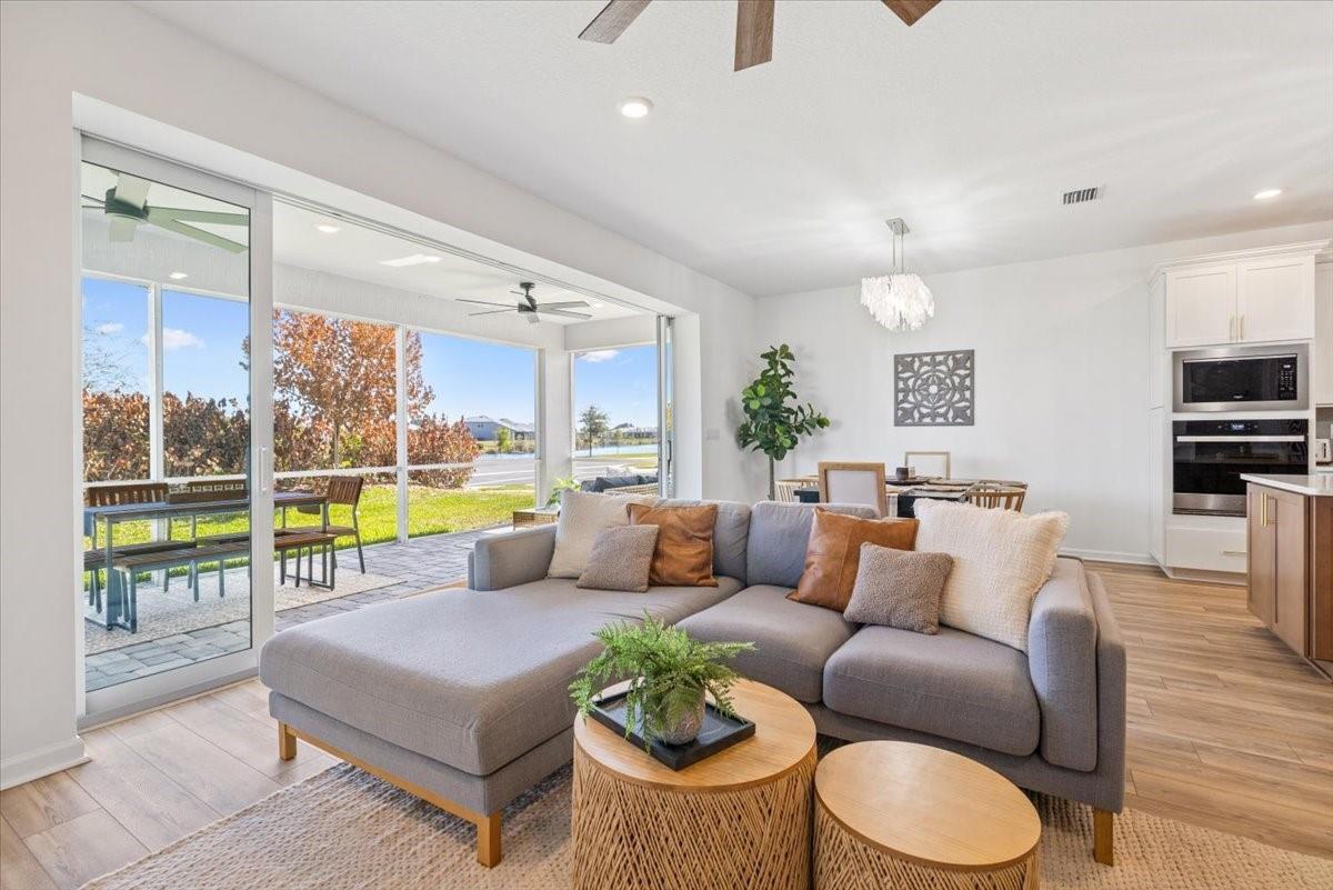 Image 4: Living Room w/ Open Sliders View