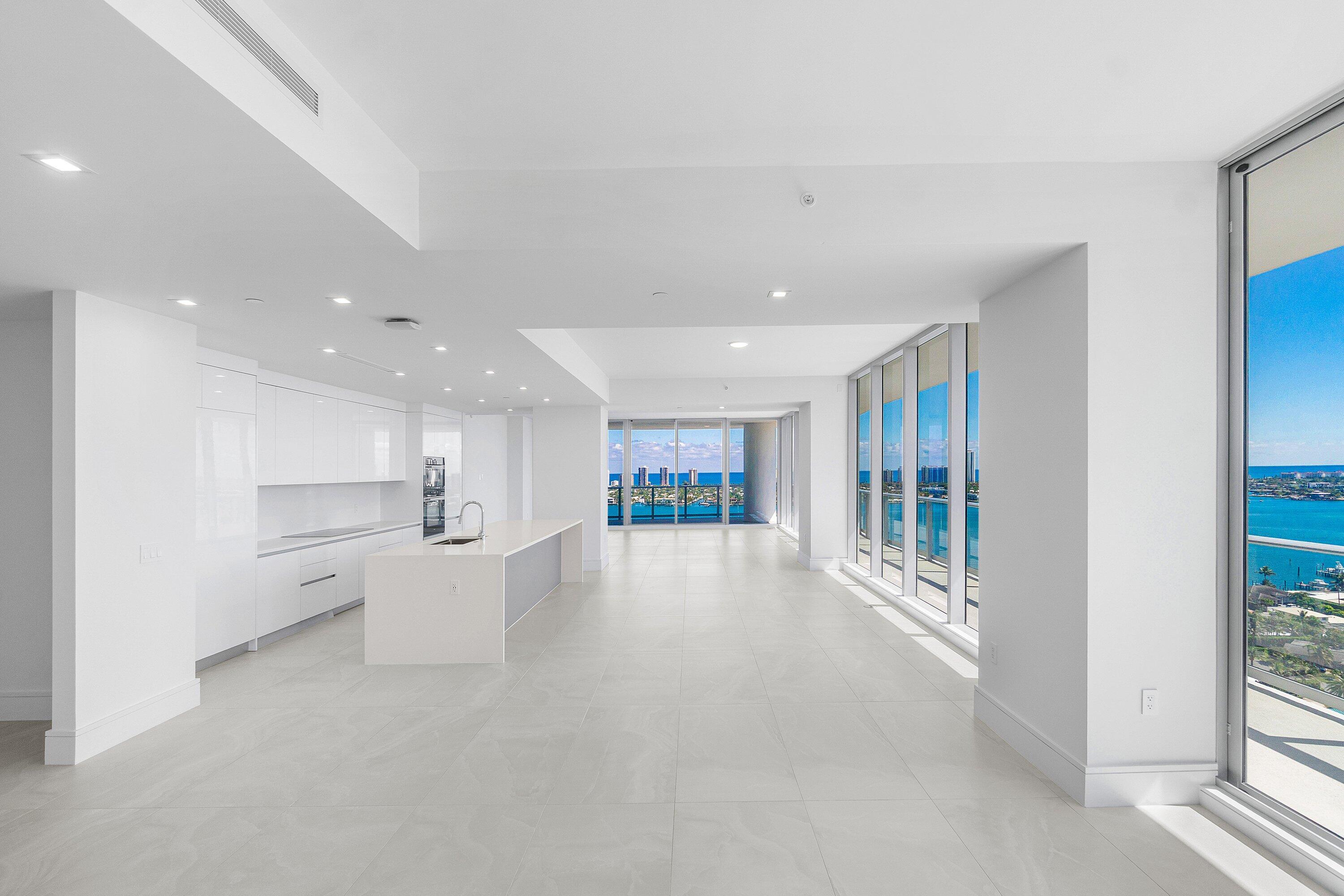 Image 3: ENTRY/DINING ROOM VIEWS; KITCHEN; LIVING AREA; FLO