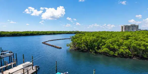Image 3: Waterfront property featuring deep blue water, and