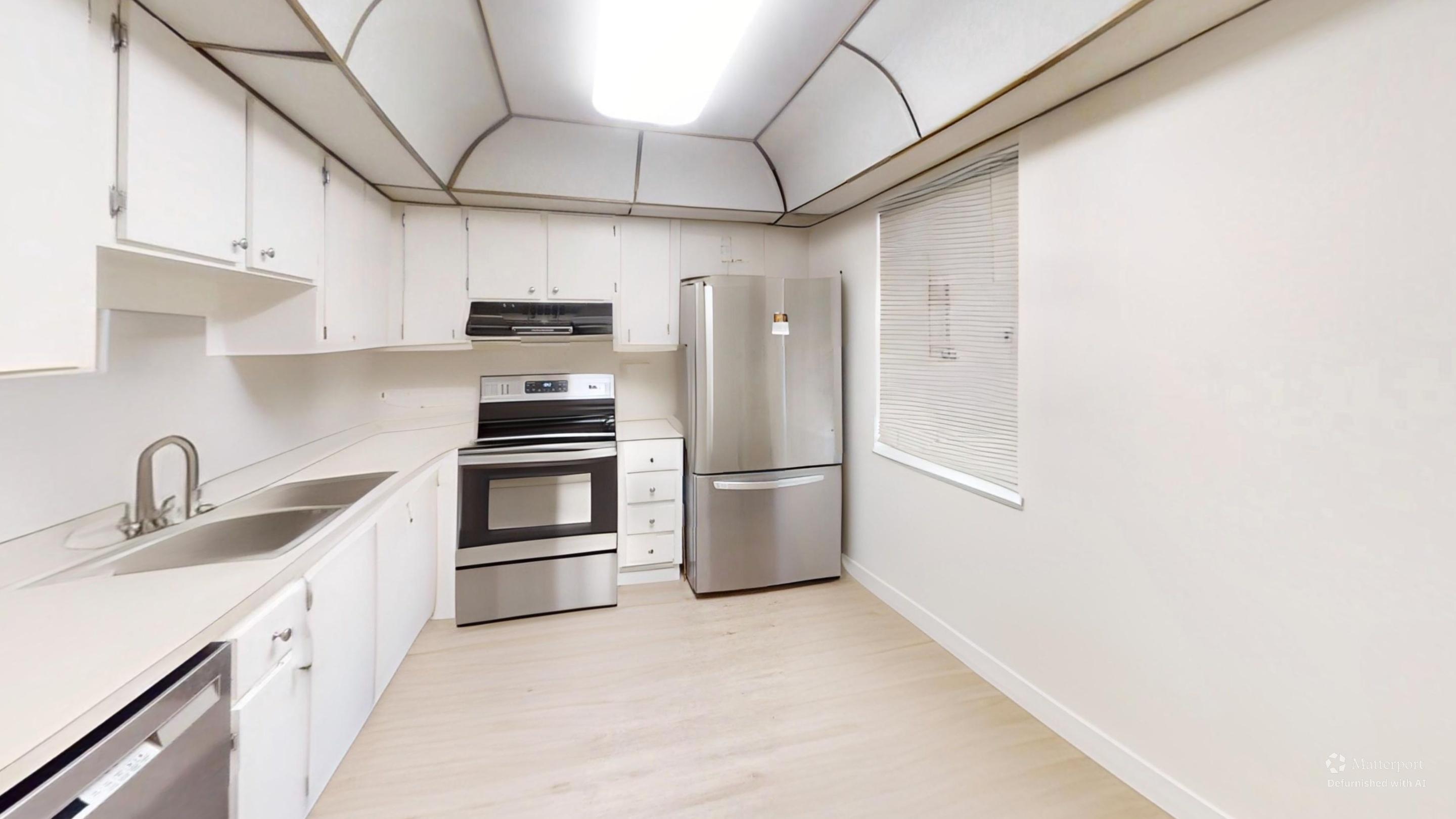 Image 3: 101-SE-Third-Ave-Kitchen-Defurnished