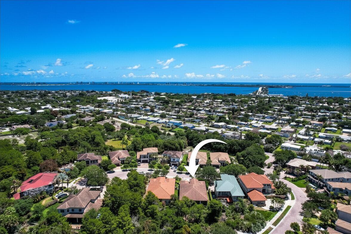Image 3: Aerial View of home and community. View to the Eas