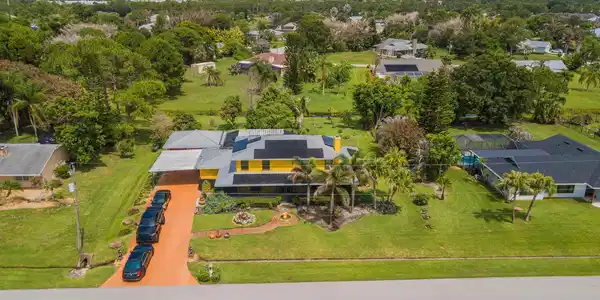 Image 4: Expansive Driveway & Carport & Detached Garage
