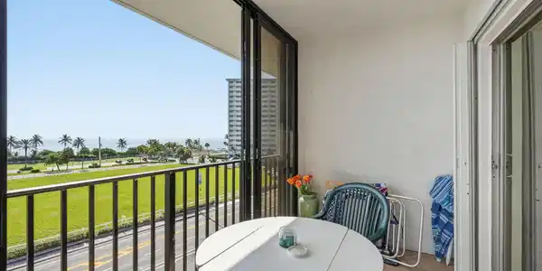 Image 4: Balcony featuring sliding glass doors, tile floori