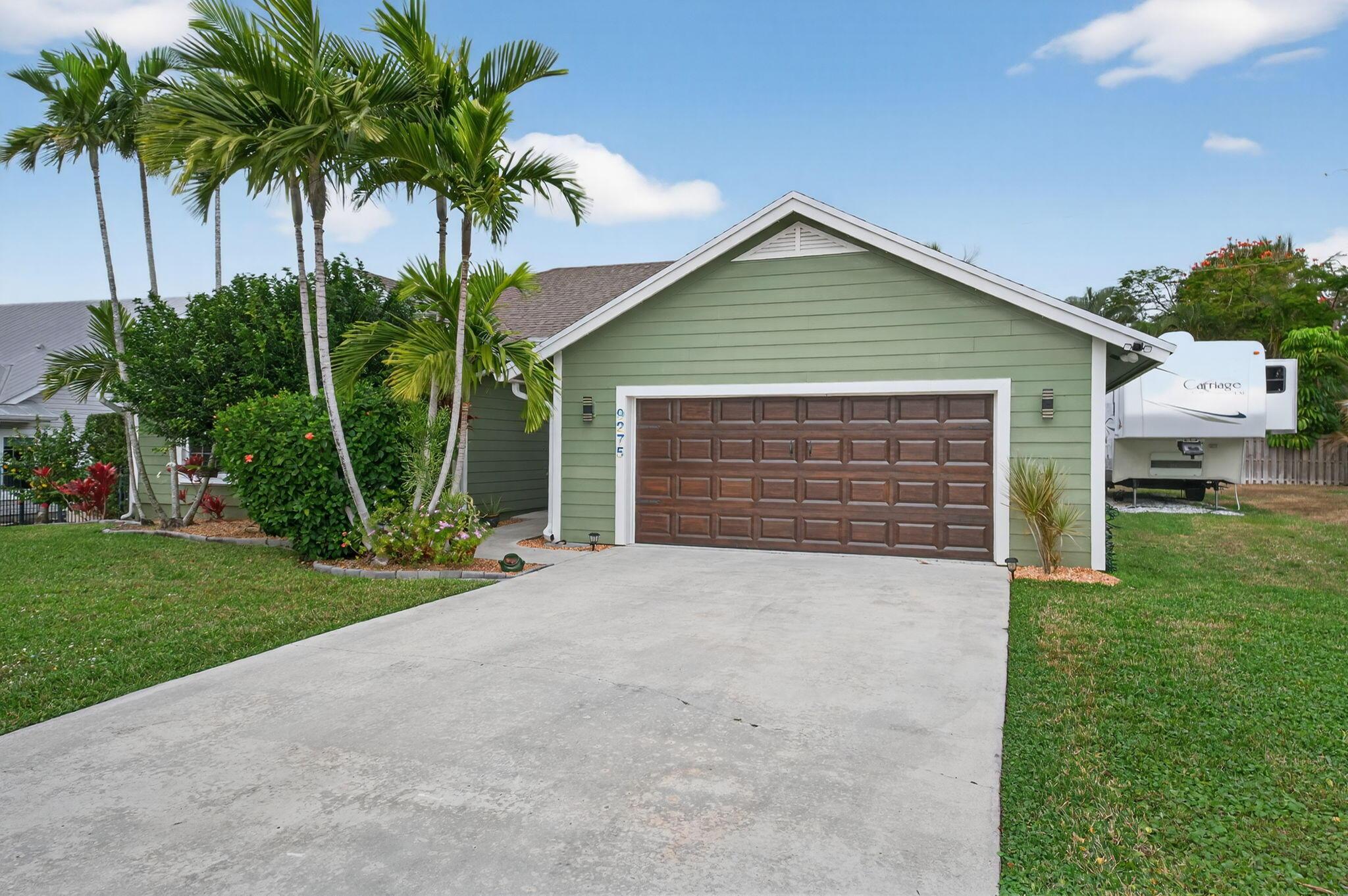Image 3: Front, garage, facing South