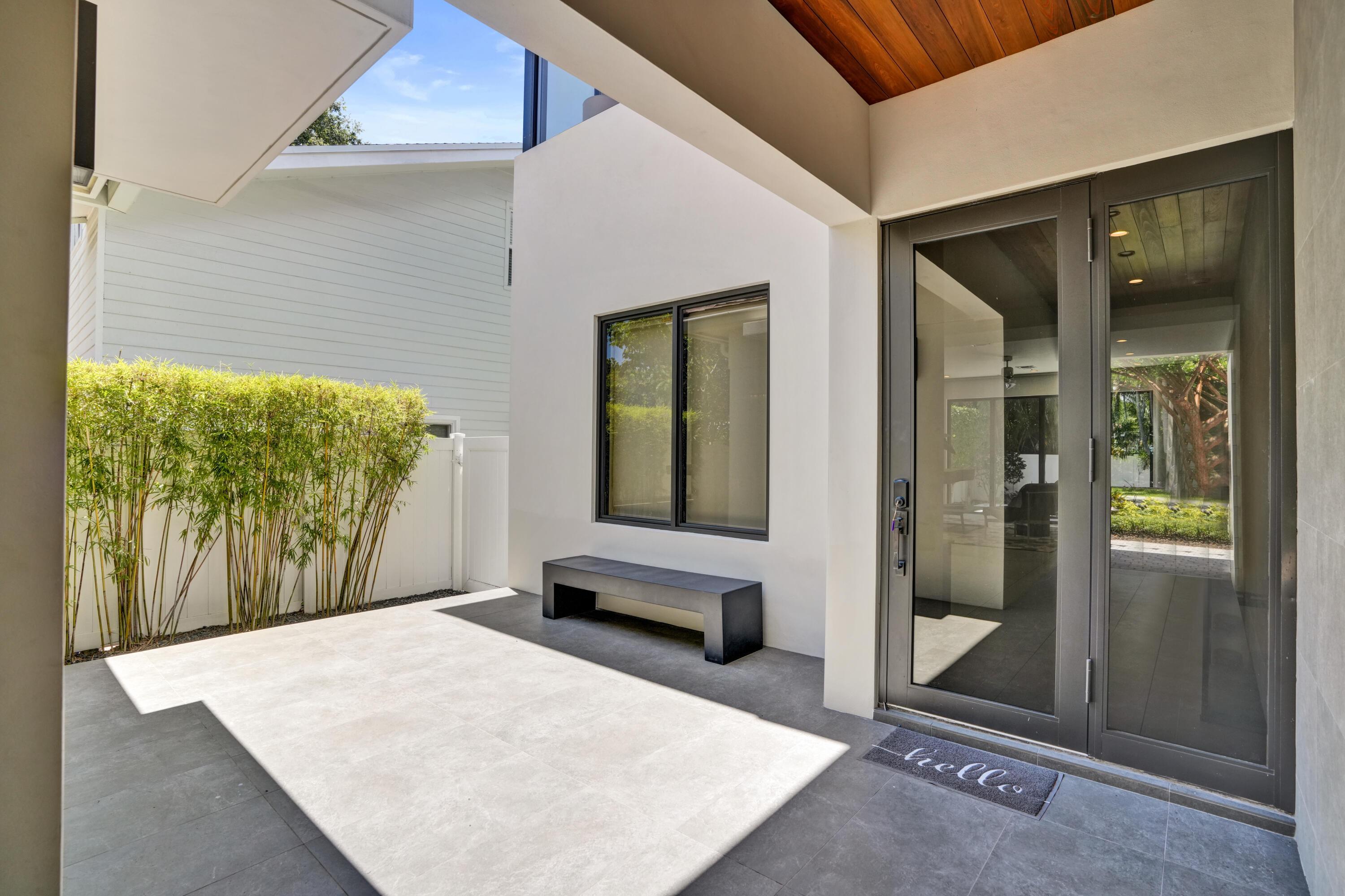 Image 3: Covered entry loggia.