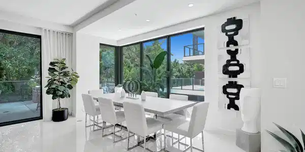 Image 2: Spacious interior featuring pristine white floorin