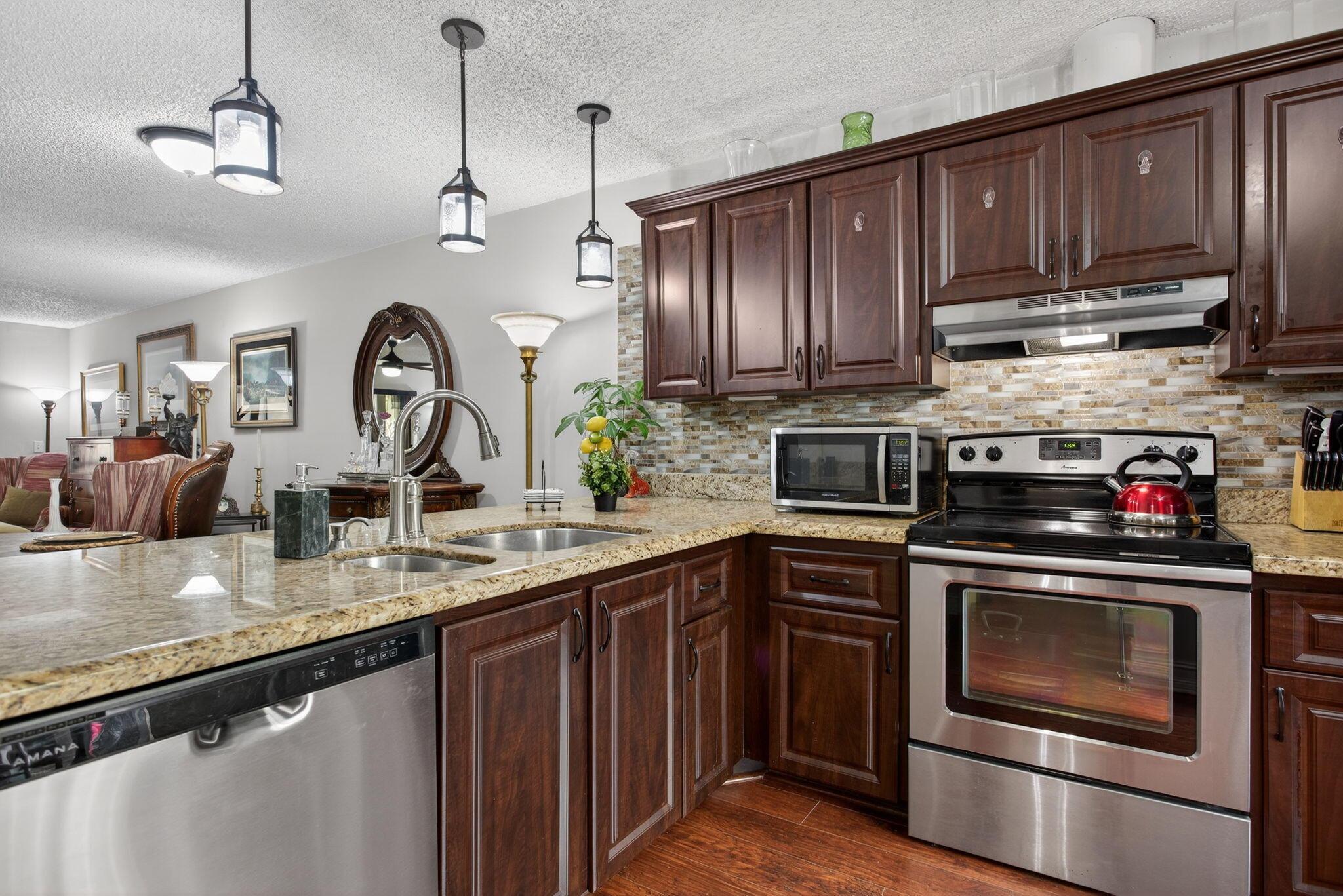 Image 3: Open Kitchen to Dining and L/R