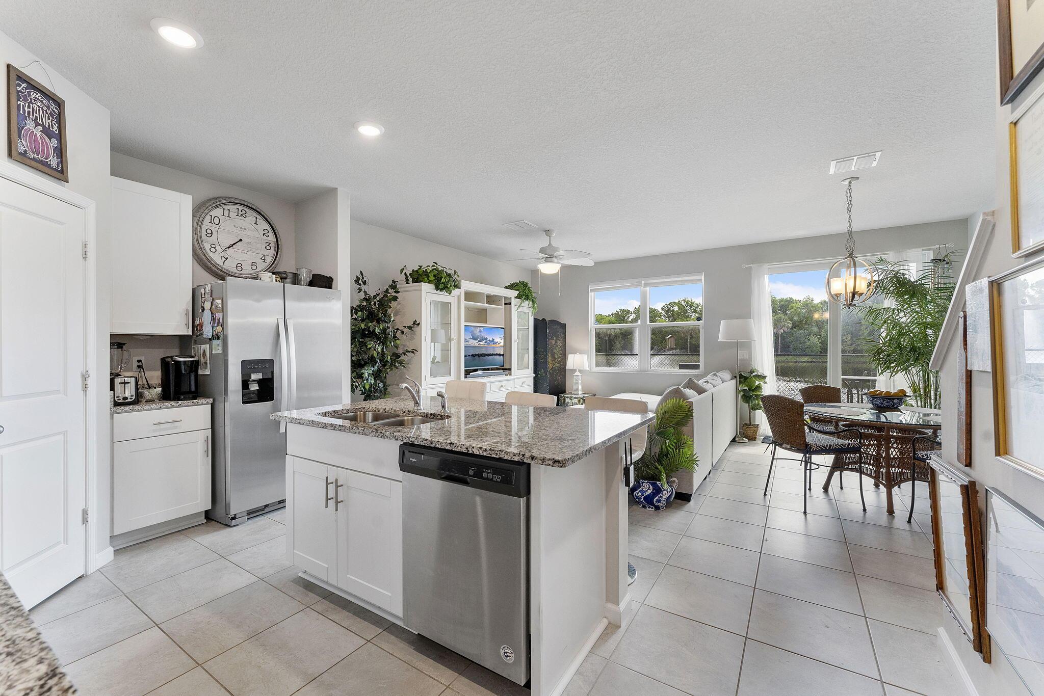 Image 2: Open Living, Dining and Kitchen