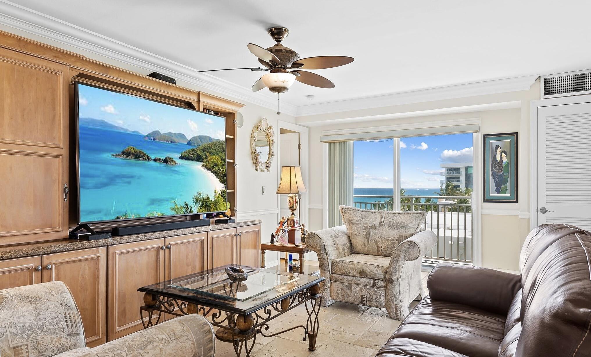 Image 4: Living room with balcony views