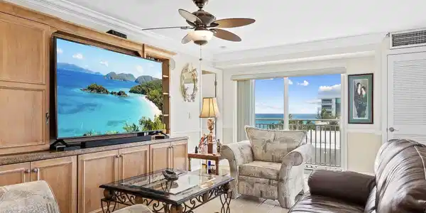 Image 4: Living room with balcony views