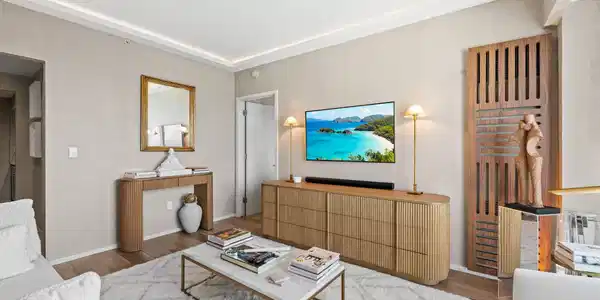Image 3: Recessed perimeter lighting, wood-finish flooring,