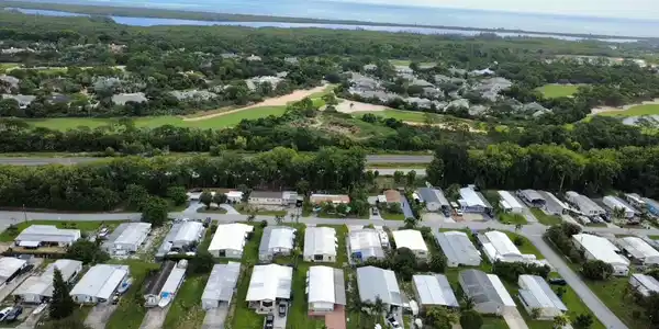 Image 2: aerial of home and ocean