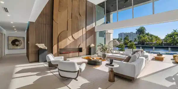 Image 3: Soaring two-story great room framed by floor-to-ce