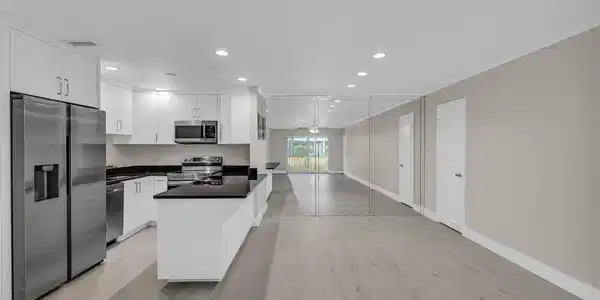 Image 4: Dining area with large pantry closet